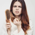Queda de cabelo na mulher: dicas de tratamento.